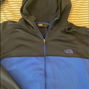 North Face hooded zip up jacket. Men’s size XXL. Black and blue.